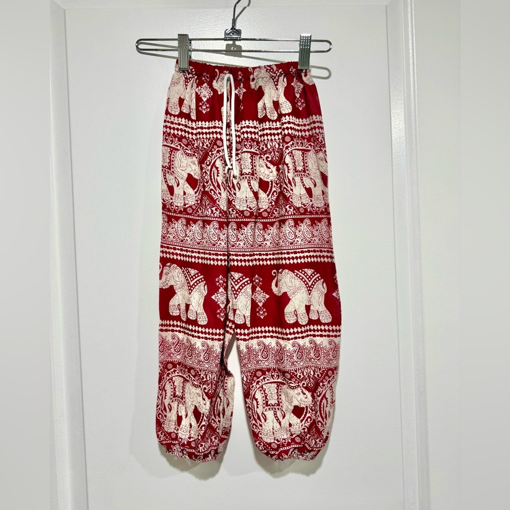 Red elephant linen pants. Bought in Thailand. Will fit a 5 to 8 year old (est.)